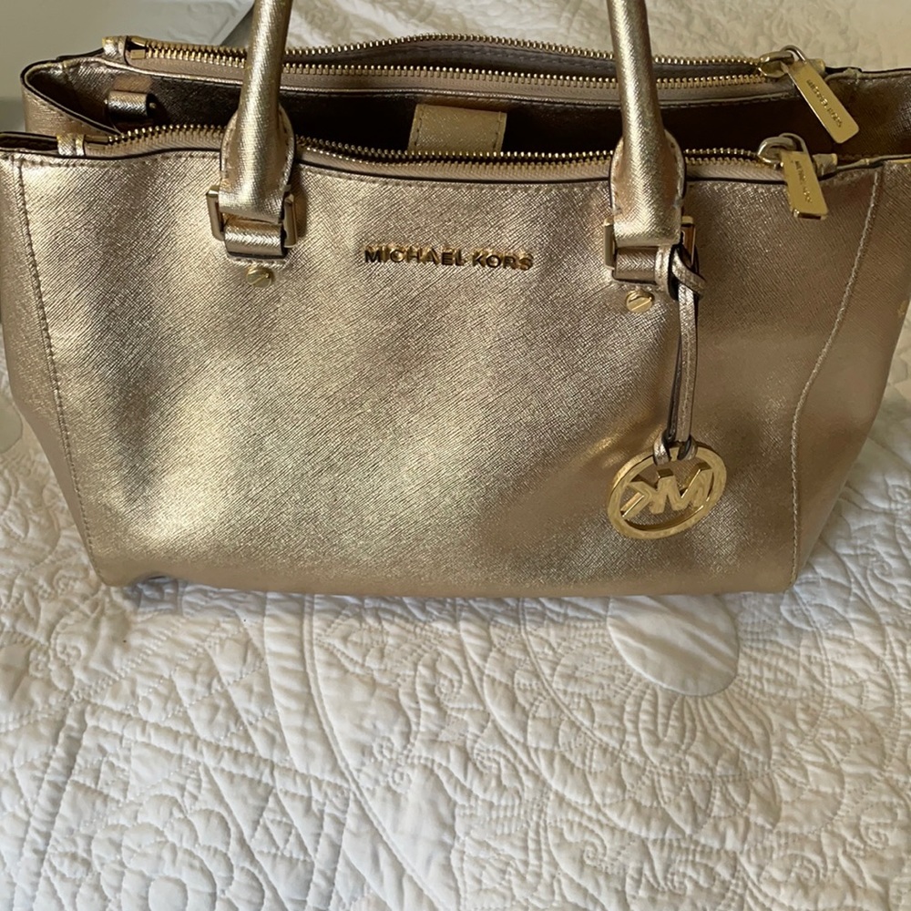 Gold Michael kors purse with wallet